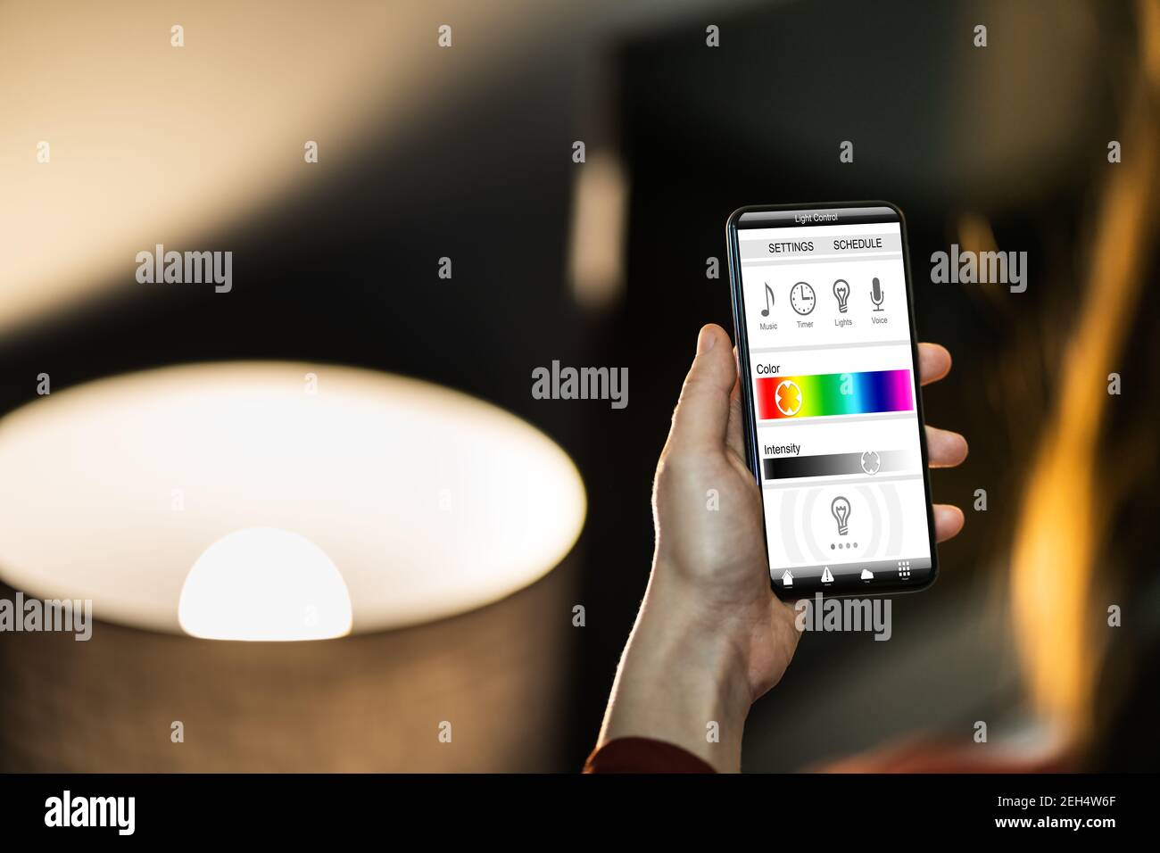 Smart Light Control At House Using Phone Stock Photo