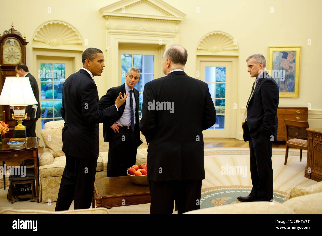 President Barack Obama talks with, left to right, Chief of Staff Rahm Emanuel, Deputy National Security Advisor Tom Donilon and  NSC Chief of Staff Denis McDonough in the Oval Office, Oct. 28, 2009. Stock Photo