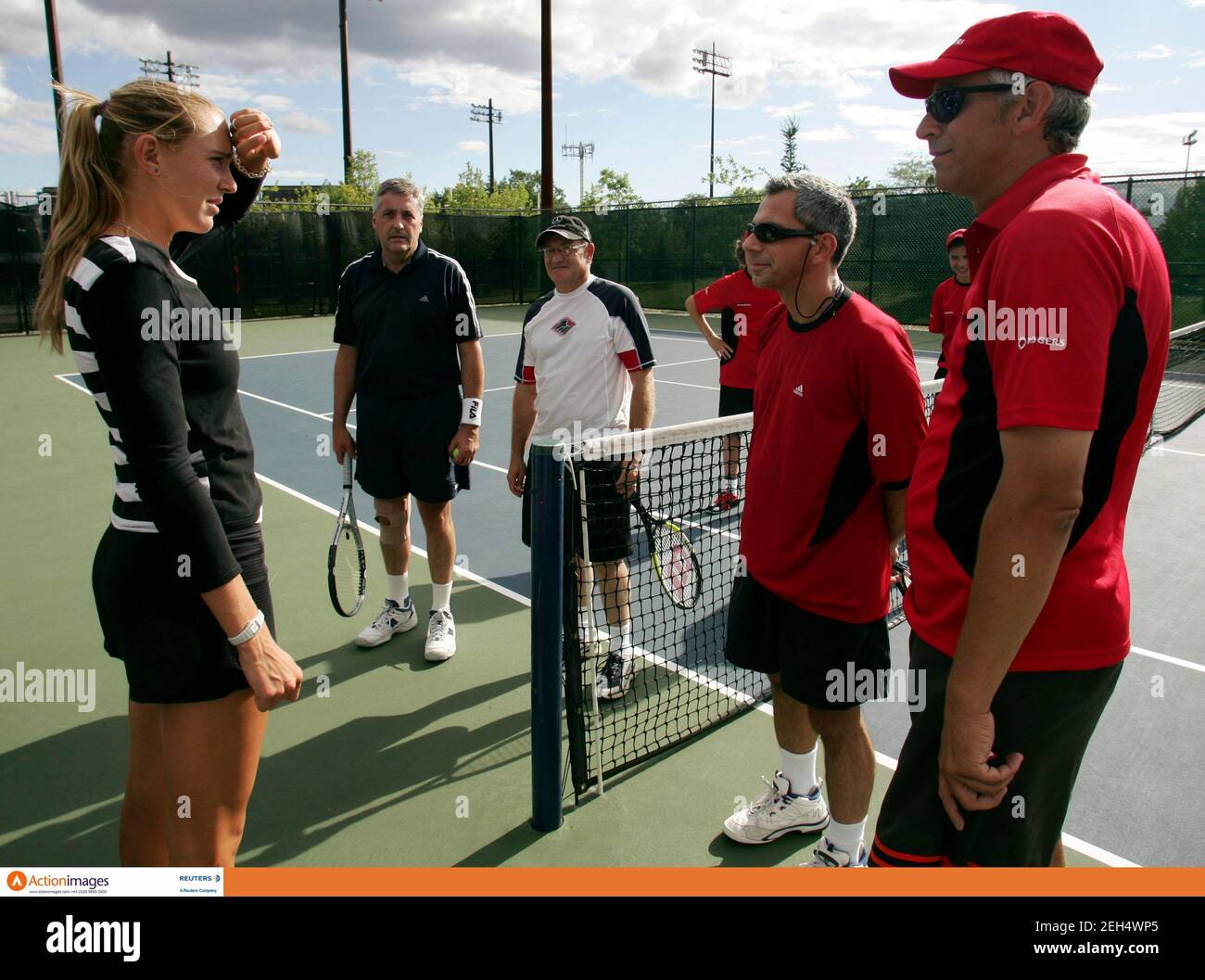 Tennis - Rogers Cup, Sony Ericsson WTA Tour - Montreal, Canada - 16/8/06  Tennis player Nicole Vaidisova of the Czech Republic (L) talks during the Rogers Pro-Am at the Rogers Cup, Sony Ericsson WTA Tour in Montreal, Canada August 16, 2006  Mandatory Credit: Action Images / Chris Wattie  Livepic Stock Photo