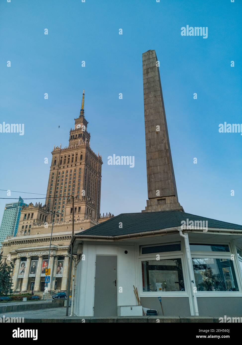 Warsaw November 10 2019 Tower of newsstand in front of tower of Palace of Culture and Science Stock Photo