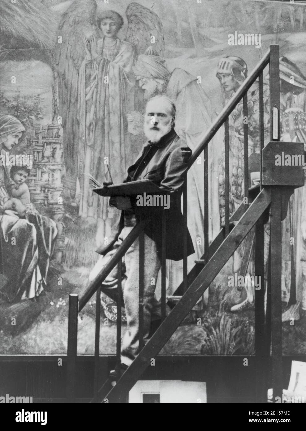 Edward Burne-Jones at work on the Star of Bethlehem, 1895. Frederick Hollyer Image taken while the artist was at work on the watercolour, Star of Bethlehem, at Birmingham Museum and Art Gallery Stock Photo