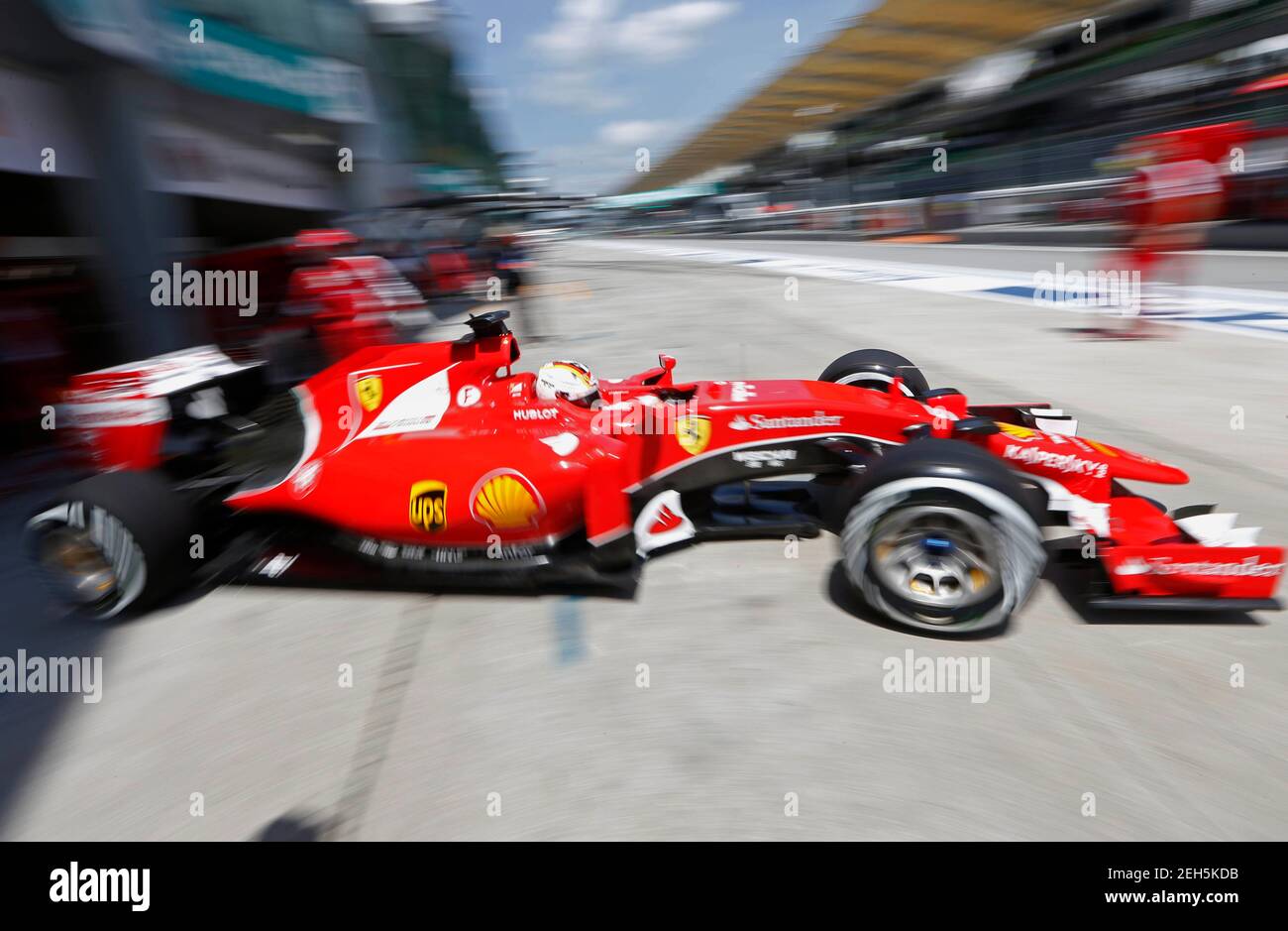 Formula One - F1 - Malaysian Grand Prix 2015 - Sepang International Circuit, Kuala Lumpur, Malaysia - 28/3/15  Ferrari's Sebastian Vettel pulls out of the garage during practice  Reuters / Olivia Harris  Livepic Stock Photo