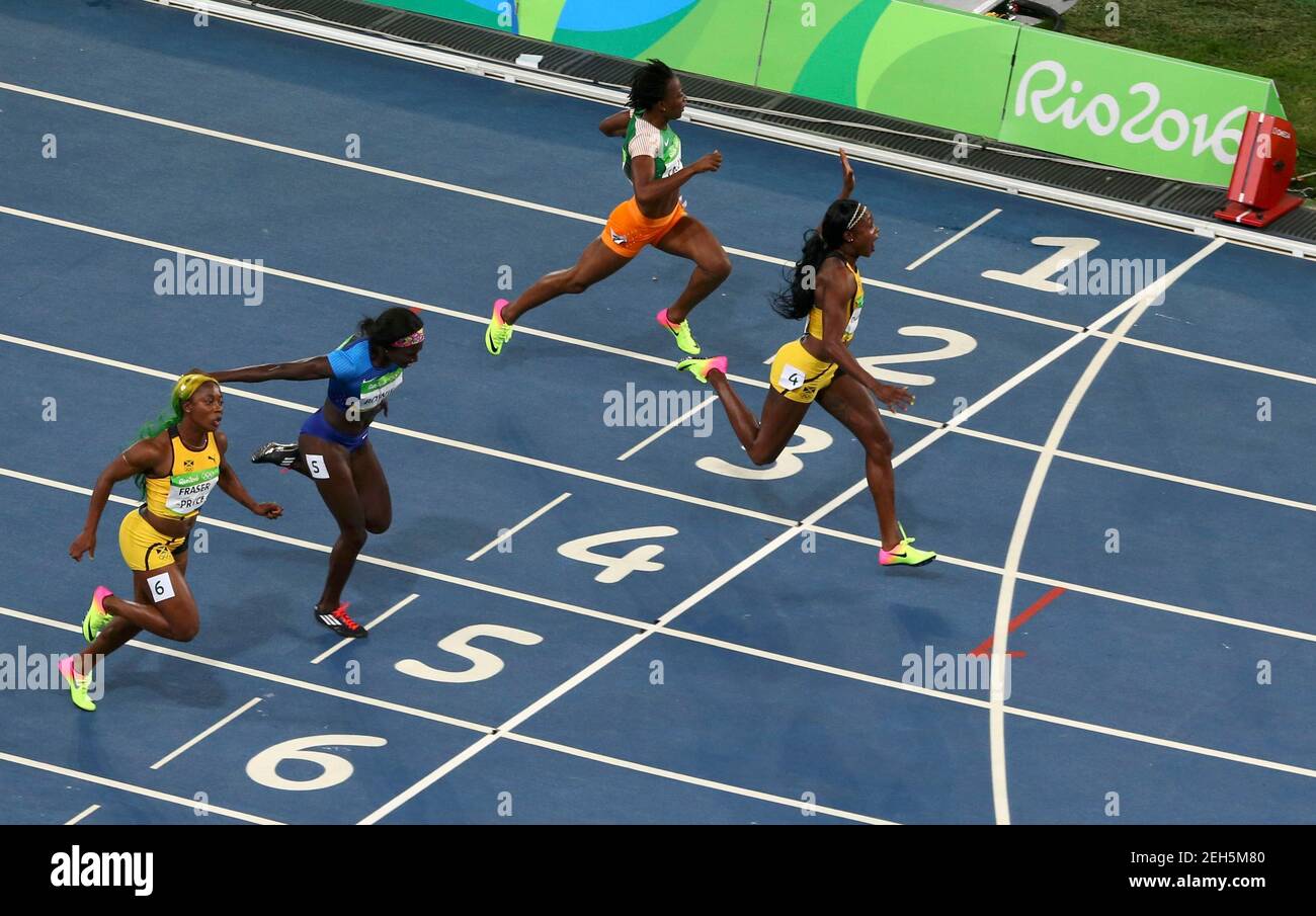 2016 Rio Olympics - Athletics - Final - Women's 100m Final - Olympic  Stadium - Rio de Janeiro, Brazil - 13/08/2016. Elaine Thompson (JAM) of  Jamaica reacts after crossing the finish line.