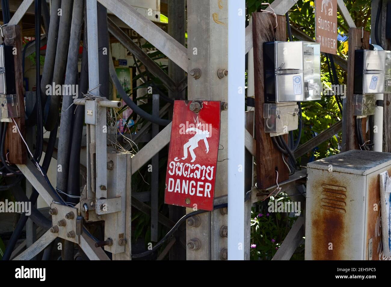 High voltage danger sign in Laos Stock Photo