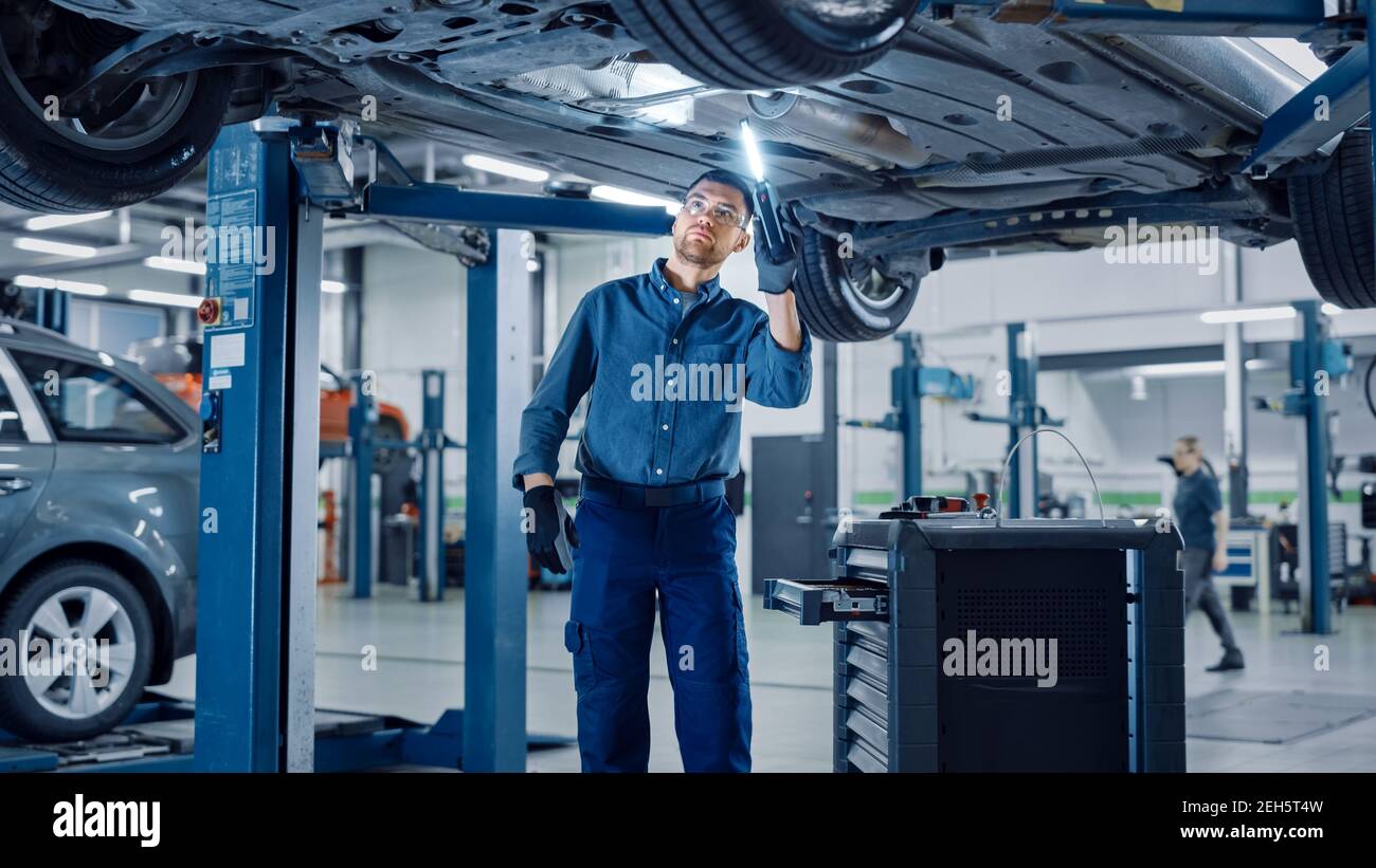 Garage car lift hi-res stock photography and images - Alamy