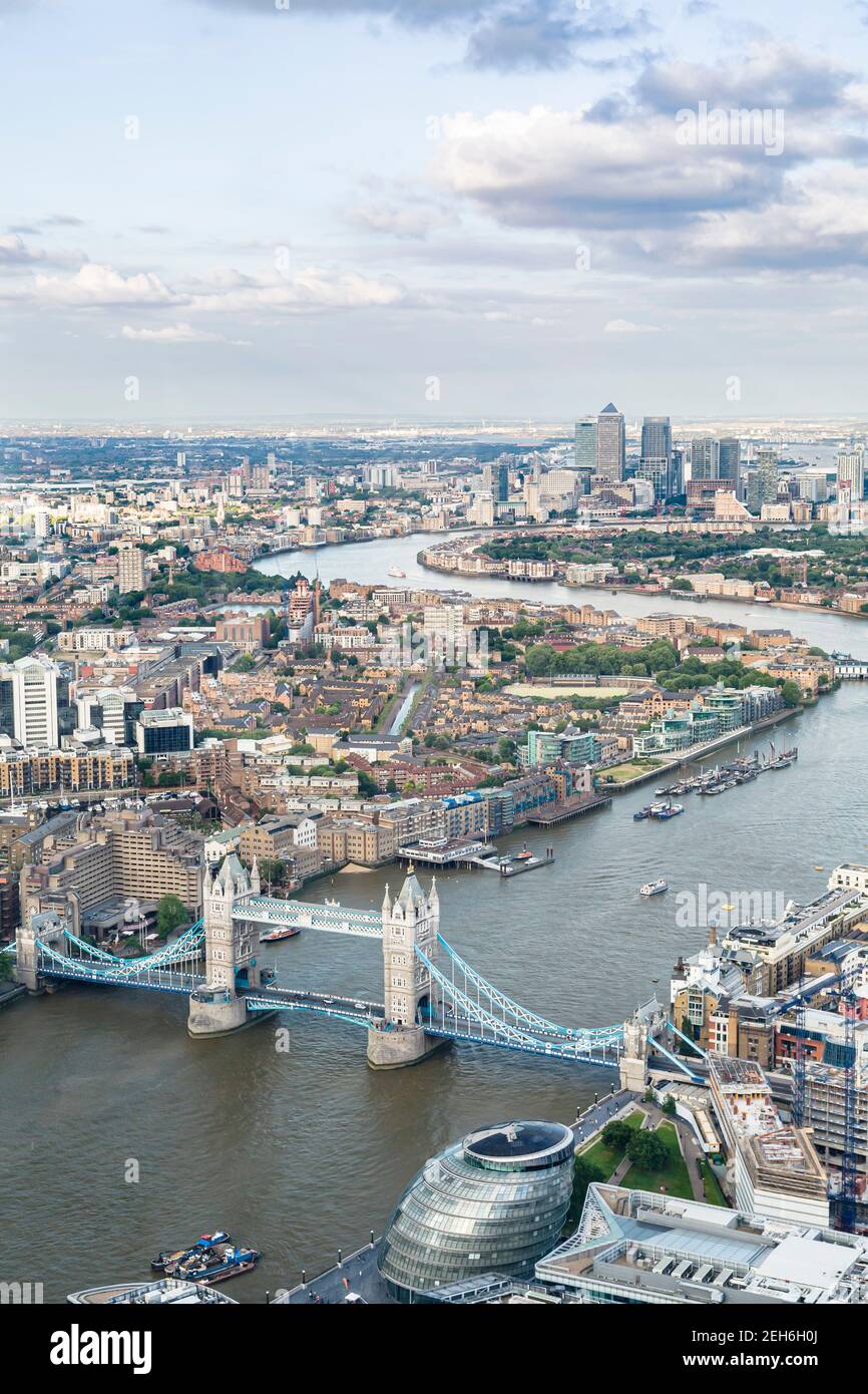 LONDON, UK - July 03, 2013. Aerial view of Tower Bridge and Canary Wharf on the River Thames, Central London Stock Photo
