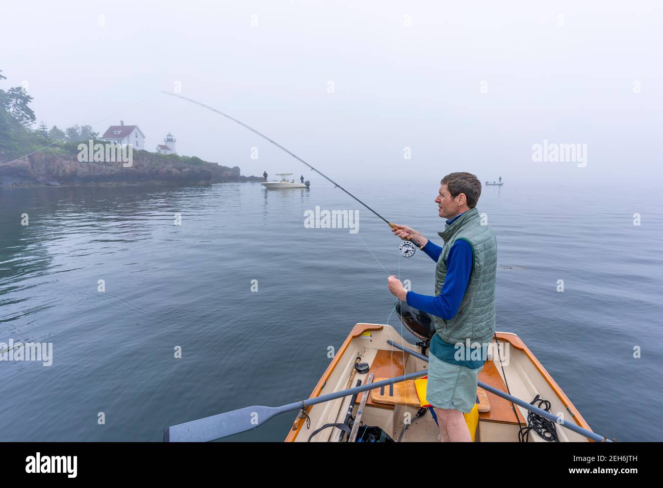 Striper fishing in Camden Harbor, Maine in the early hours of the