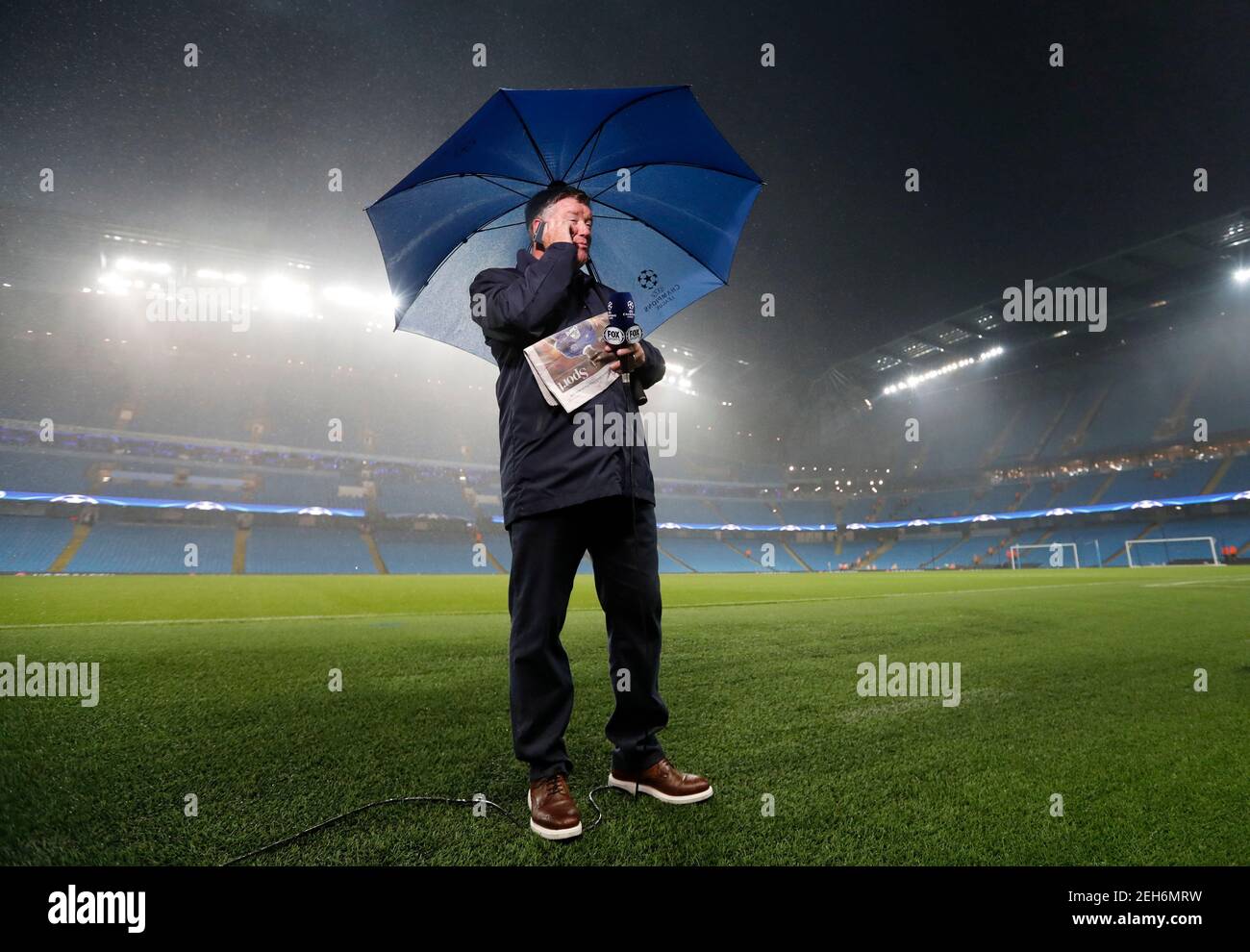 Football Soccer Britain - Manchester City v Borussia Monchengladbach - UEFA Champions  League Group Stage - Group C - Etihad Stadium, Manchester, England -  13/9/16 TV Presenter Geoff Shreeves during a storm
