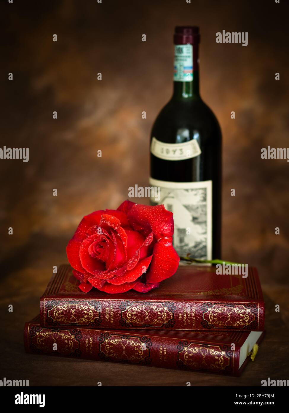 Red rose with classic literature and red wine Stock Photo Alamy