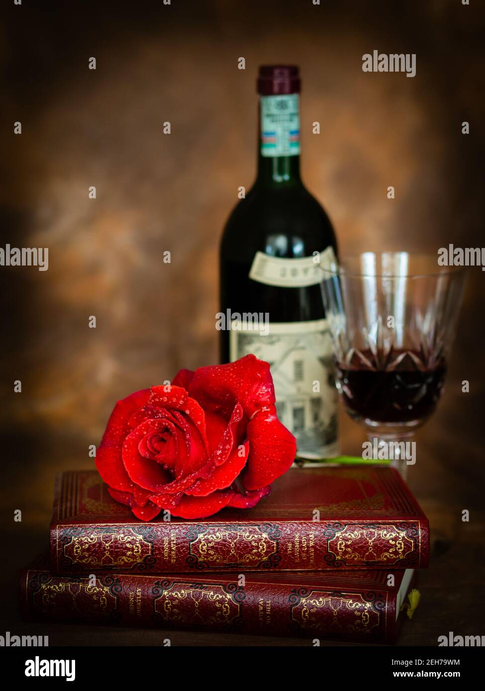 Red rose with classic literature and red wine Stock Photo Alamy