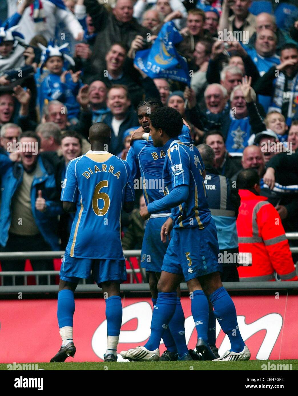 Football - Portsmouth v West Bromwich Albion - FA Cup Semi Final - Wembley Stadium - 07/08 - 5/4/08  Nwankwo Kanu celebrates scoring the first goal for Portsmouth with Lassana Diarra (L) and Glen Johnson (R)  Mandatory Credit: Action Images / Peter Cziborra Stock Photo