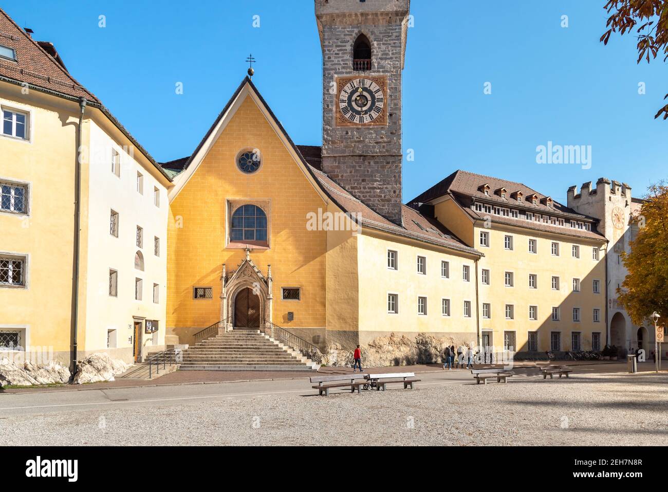 Bell tower of the Ursulinen Holy Saviour church in the historic city of Bruneck or Brunico, South Tyrol, Italy Stock Photo