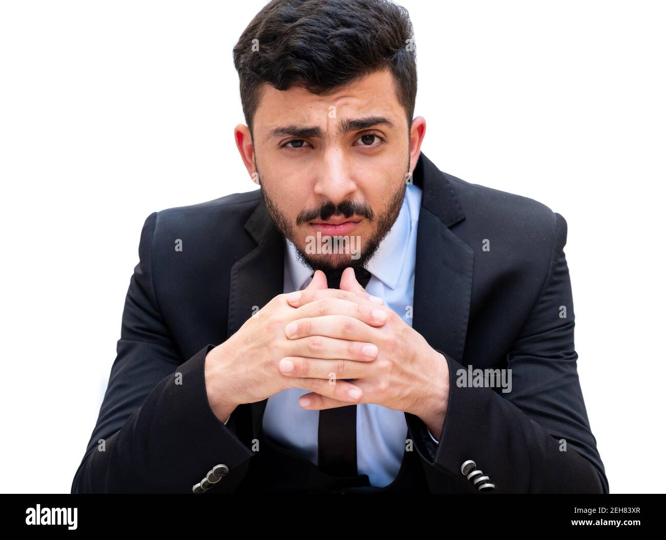 Cheerful young guy wearing tuxedo with high confidence and ready for the next Stock Photo