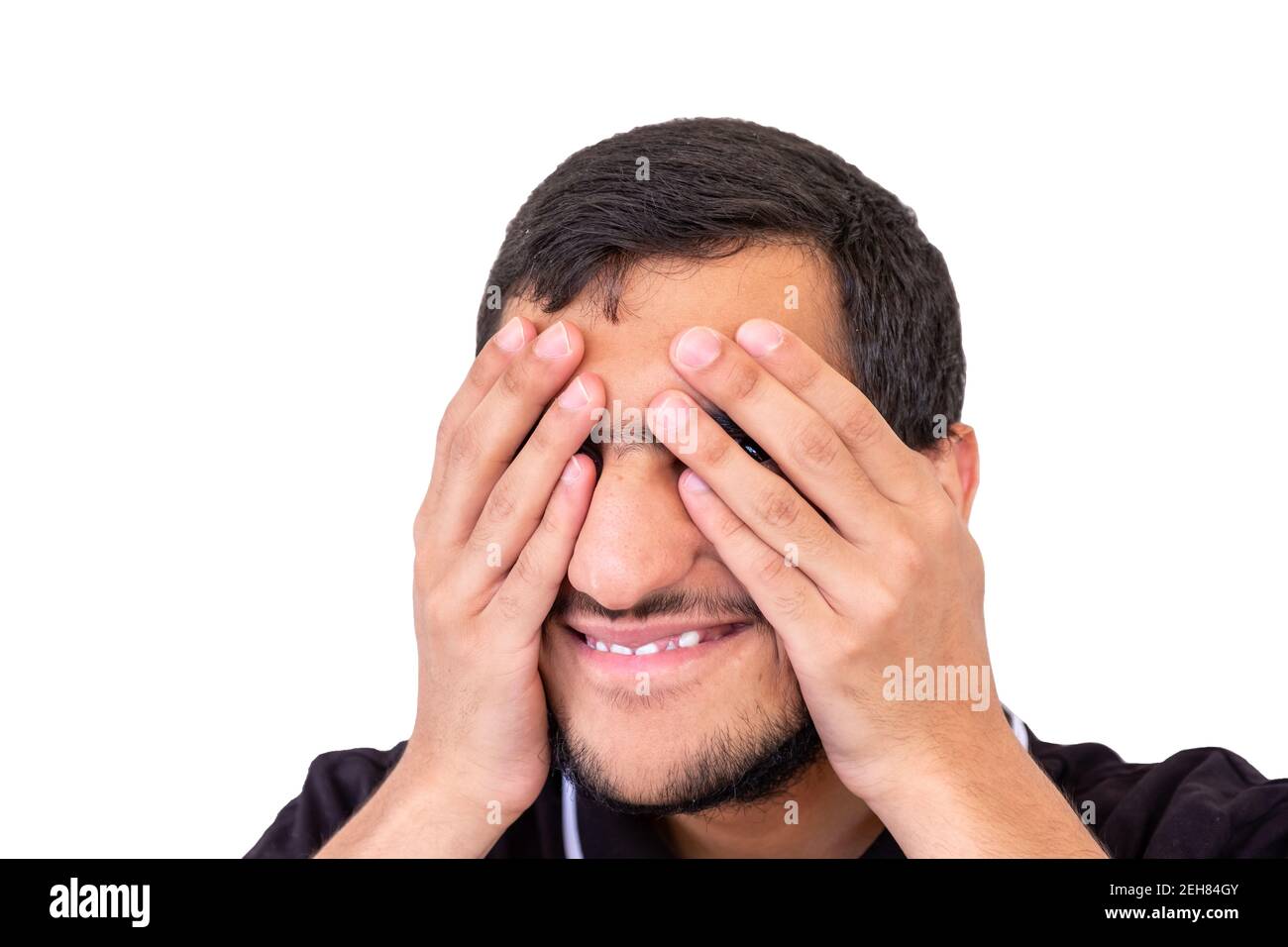Arabic boy covering his eyes with his hands Stock Photo - Alamy