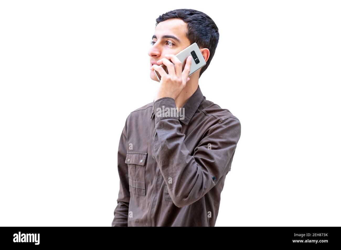 Arabic guy using smartphone to make a call Stock Photo