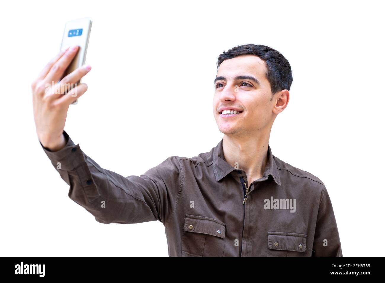 Arabic guy using smartphone to make a call Stock Photo