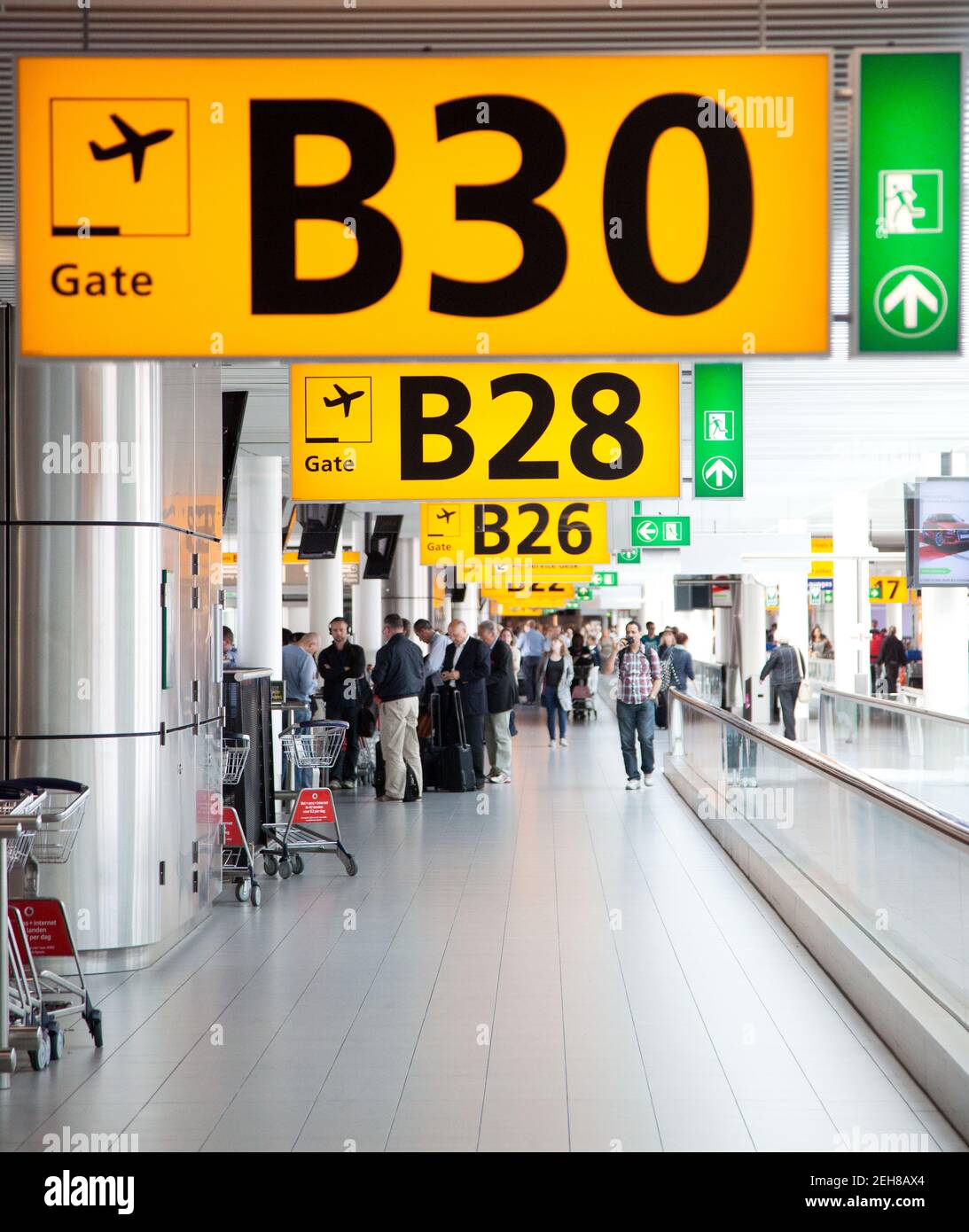 AMSTERDAM, HOLLAND- 10 APRIL 2014:Gate at Schiphol airport in Amsterdam ...