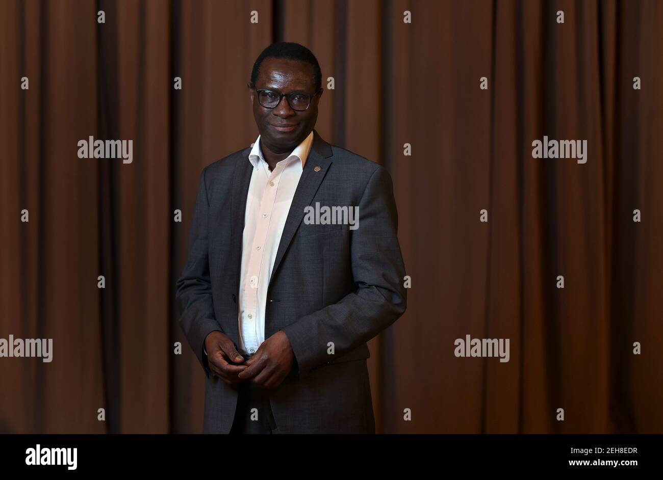 Magdeburg, Germany. 19th Feb, 2021. Member of the Bundestag Karamba Diaby poses at the presence party conference of the SPD Saxony-Anhalt in Magdeburg. Karamba Diaby is leading the Saxony-Anhalt SPD into the Bundestag election campaign. At a party conference, the man from Halle prevailed against the former state chairwoman Budde. Credit: Ronny Hartmann/dpa-Zentralbild/dpa/Alamy Live News Stock Photo