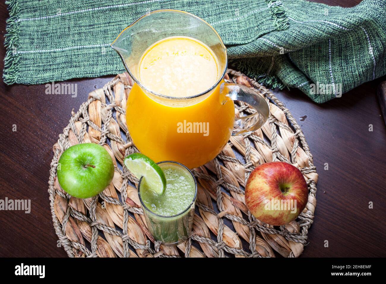 juice jar with glasses and assorted juices Stock Photo Alamy