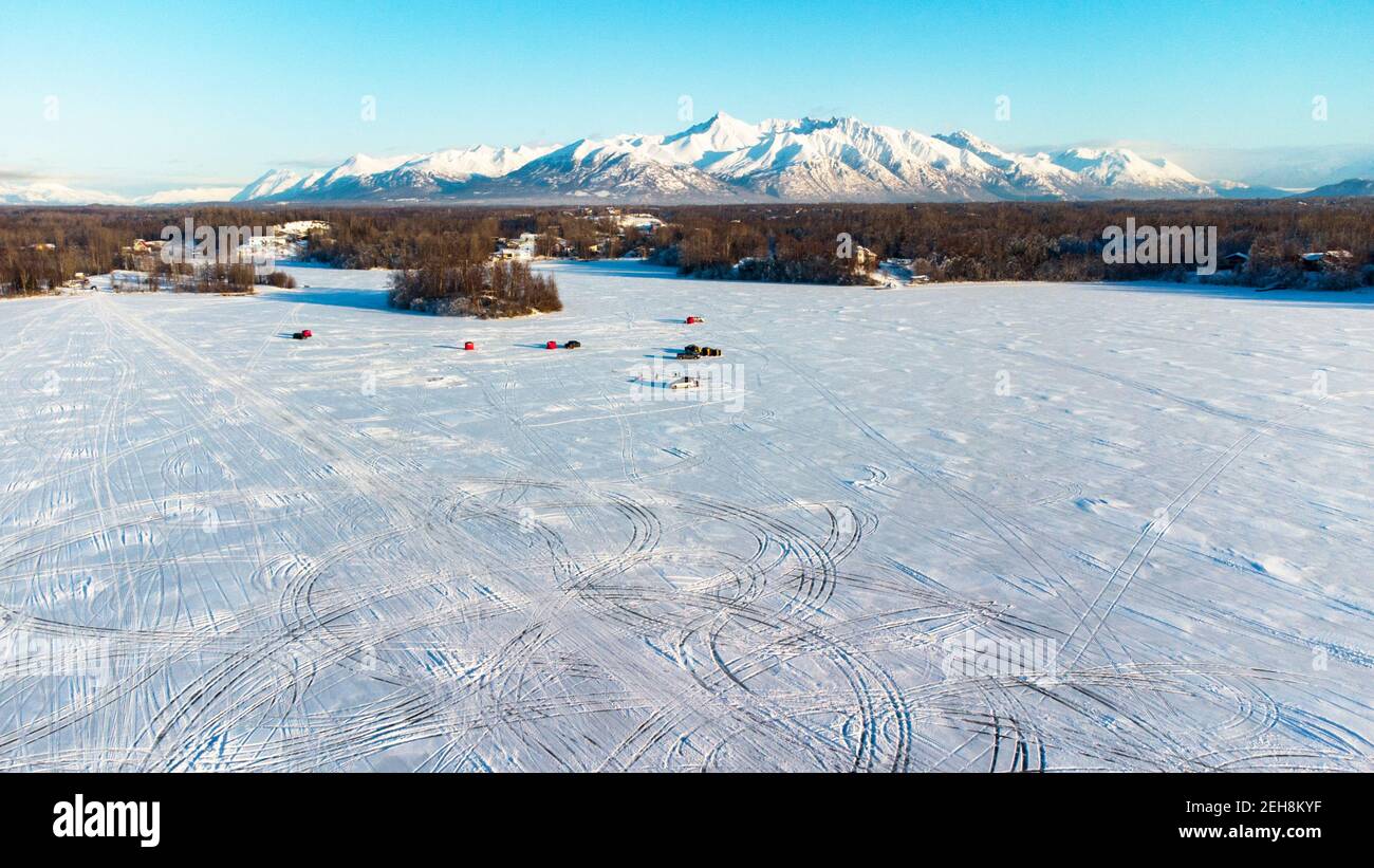 Ice fishing on Long Lake. Palmer, Alaska Stock Photo - Alamy