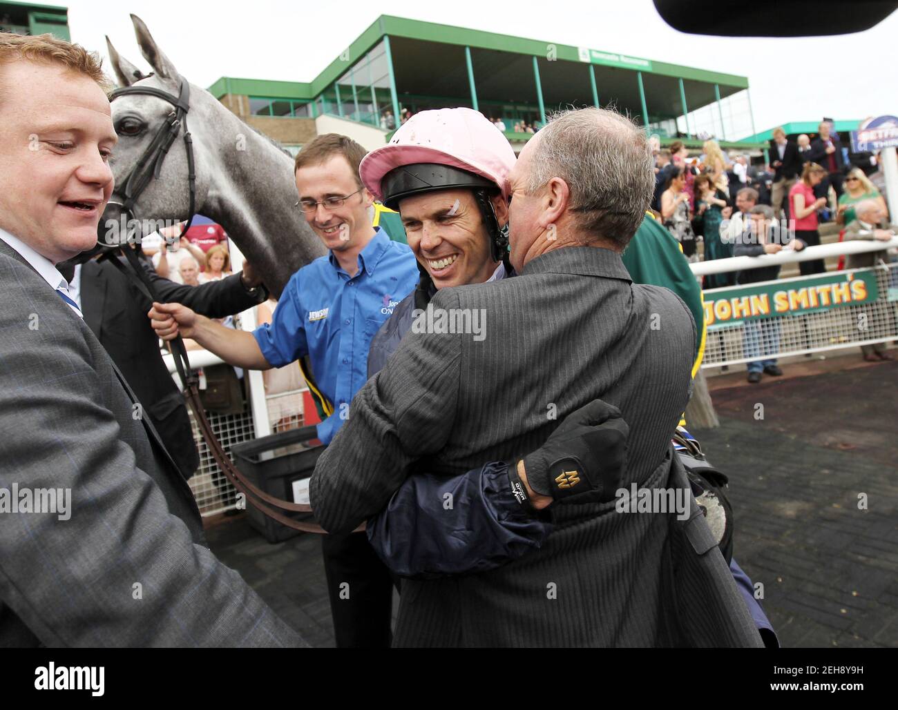 Horse Racing - Northumberland Plate - Newcastle Racecourse - 29/6/13  Trainer Jonjo O'Neill (R) and jockey Graham Lee celebrate after winning the 15.15 The John Smiths Northumberland Plate with Tominator  Mandatory Credit: Action Images / Ed Sykes  Livepic Stock Photo