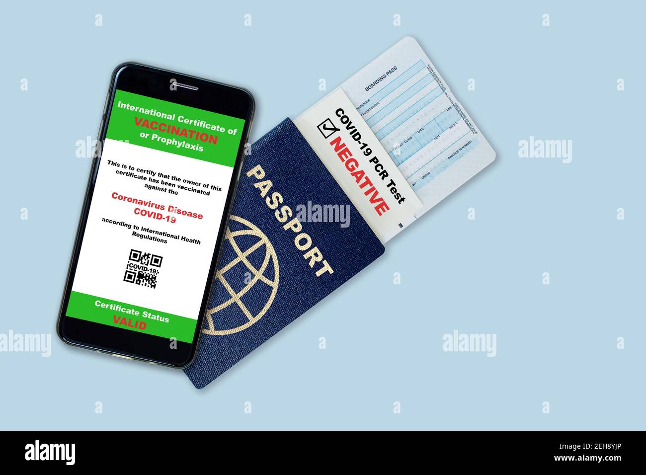 Smartphone on travel passport, boarding pass with digital certificate of COVID-19 vaccination and proof of negative COVID test result. Concept of new Stock Photo