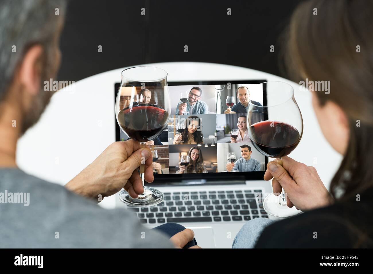 Virtual Wine Tasting Online Event On Laptop Stock Photo