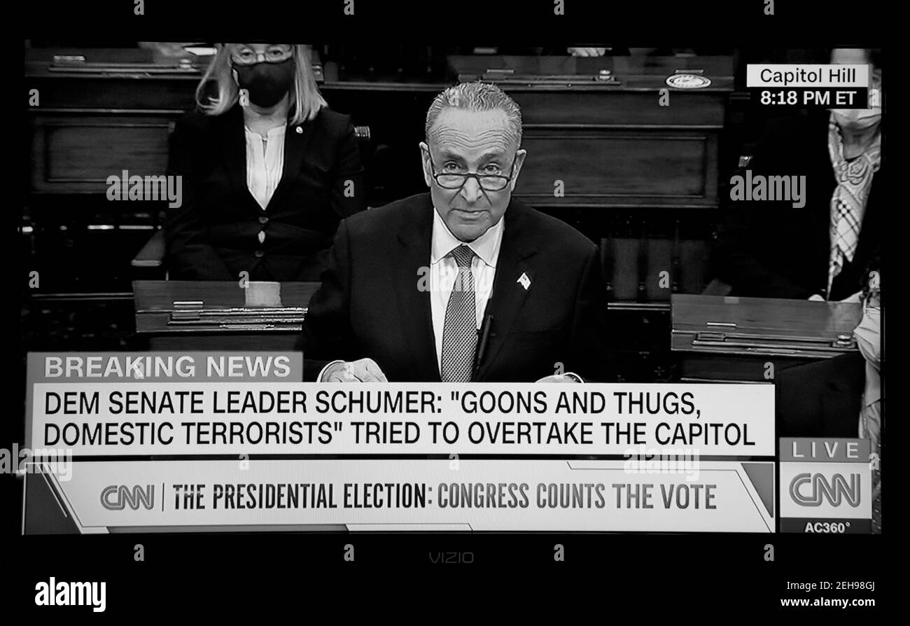A CNN screenshot Senator Chuck Schumer addressing the Senate after supporters of President Trump disrupted the counting of Electoral College votes. Stock Photo