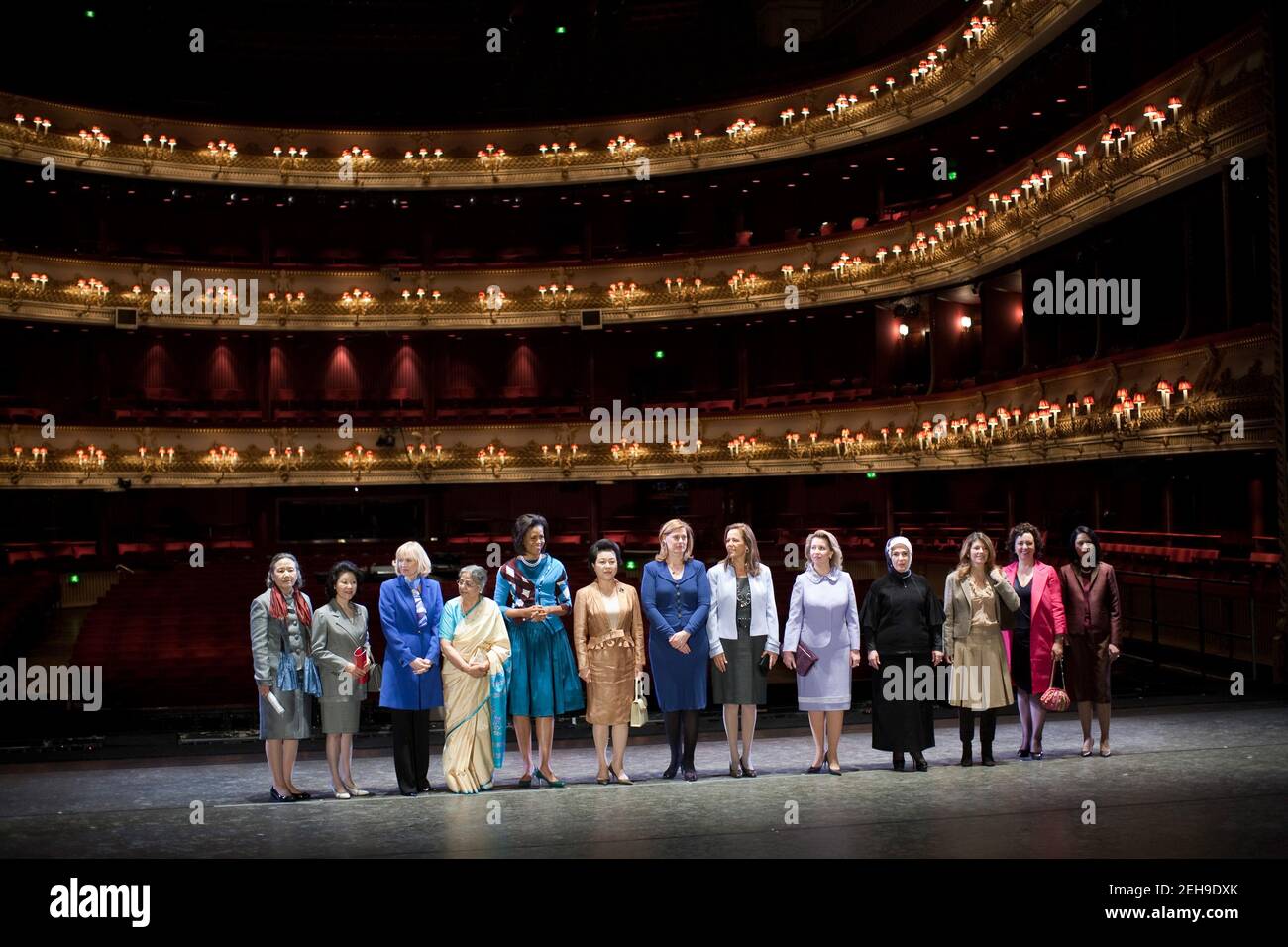 First Lady Michelle Obama poses with G-20 Summit Spouses at the Royal Opera House in London, Englad, April 2, 2009. Stock Photo