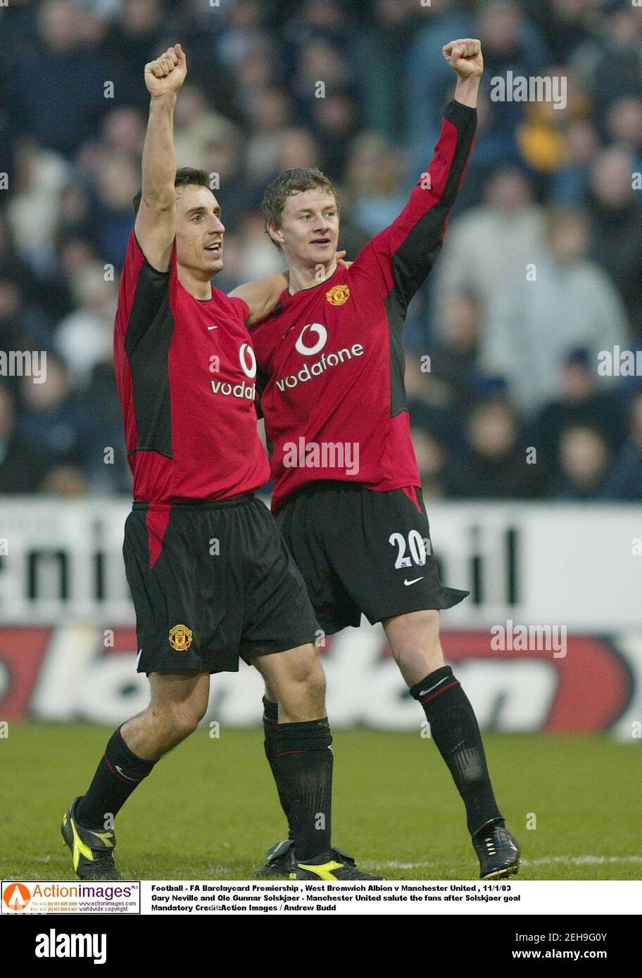 Football - FA Barclaycard Premiership , West Bromwich Albion v Manchester United , 11/1/03  Gary Neville and Ole Gunnar Solskjaer - Manchester United salute the fans after Solskjaer goal  Mandatory Credit:Action Images / Andrew Budd Stock Photo