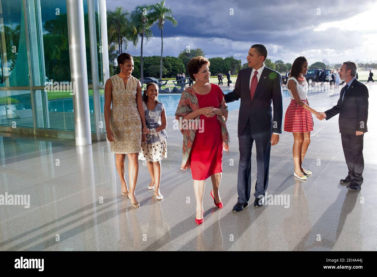 March 19, 2011 'The late afternoon light was bouncing off the glass and steel at the Palacio do Alvorada in Brasilia, Brazil, as the President and his family arrived to greet Brazilian President Dilma Rousseff and foreign Minister Antonio Patriota. I was backpedaling as I made this picture and in retrospect wish that I had taken this at a lower angle.' Stock Photo