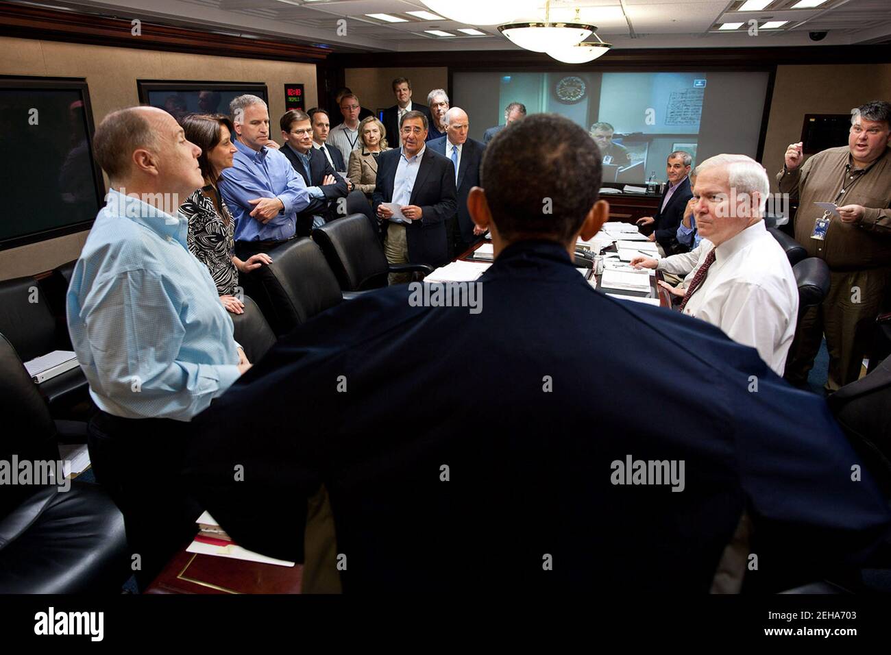 President Barack Obama talks with members of the national security team at the conclusion of one in a series of meetings discussing the mission against Osama bin Laden, in the Situation Room of the White House, May 1, 2011. Gen. James Cartwright, Vice Chairman of the Joint Chiefs of Staff, is seen on the screen. Stock Photo