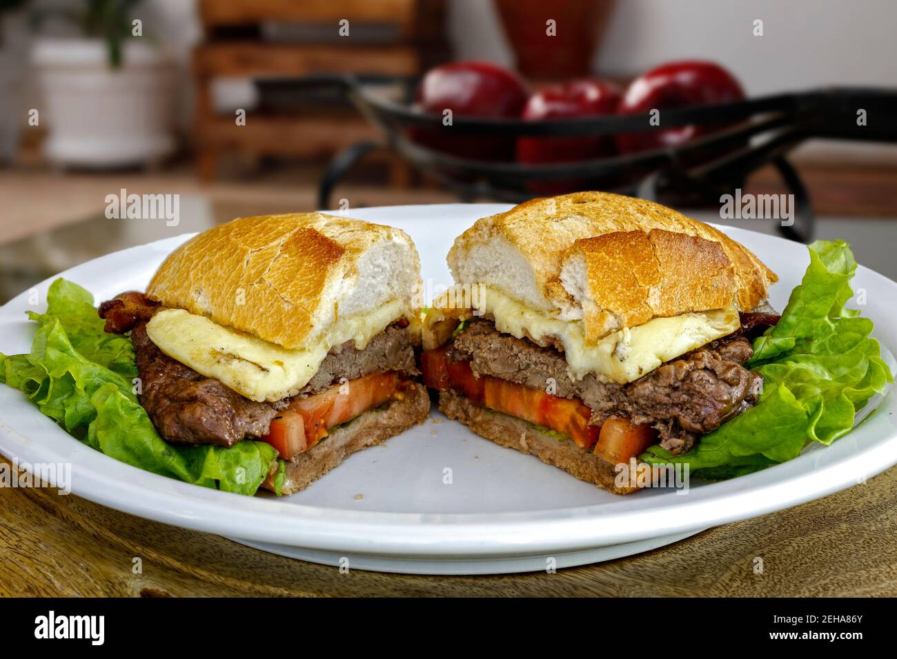 French bread sandwich with filet mignon, cheese, lettuce and tomato