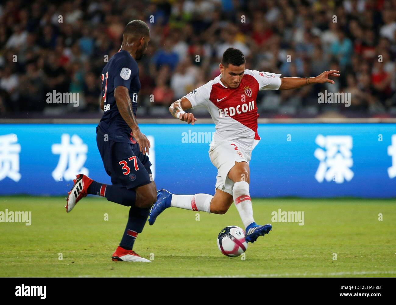 Soccer Football - French Super Cup Trophee des Champions - Paris St Germain v AS Monaco - Shenzhen Universiade Sports Centre, Shenzhen, China - August 4, 2018   Paris St Germain's Kevin Rimane in action with AS Monaco's Rony Lopes   REUTERS/Bobby Yip Stock Photo