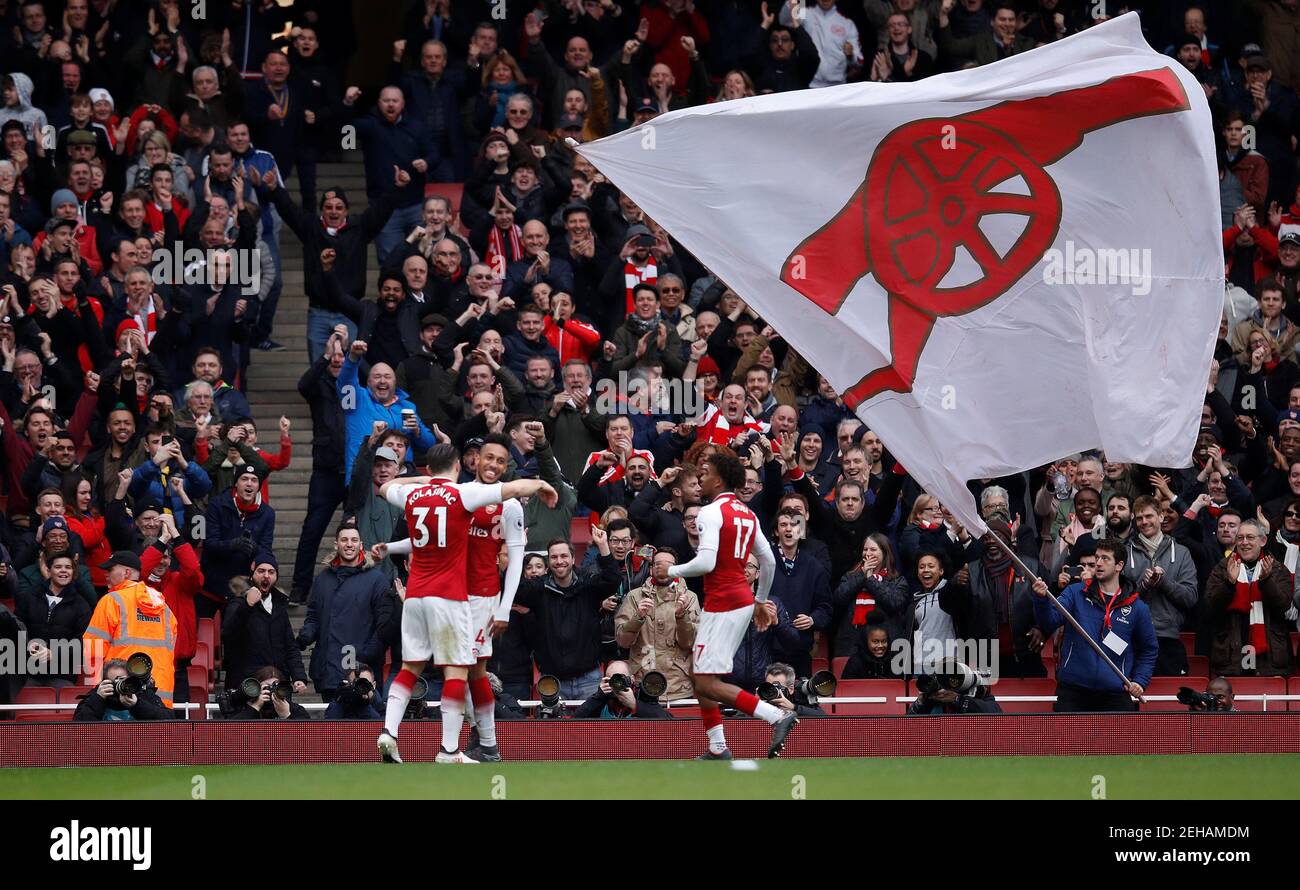 Soccer Football - Premier League - Arsenal vs Watford - Emirates Stadium, London, Britain - March 11, 2018 Arsenal's Pierre-Emerick Aubameyang celebrates scoring their second goal with team mates REUTERS/Eddie Keogh EDITORIAL USE ONLY. No use with unauthorized audio, video, data, fixture lists, club/league logos or "live" services. Online in-match use limited to 75 images, no video emulation. No use in betting, games or single club/league/player publications. Please contact your account representative for further details. Stock Photo
