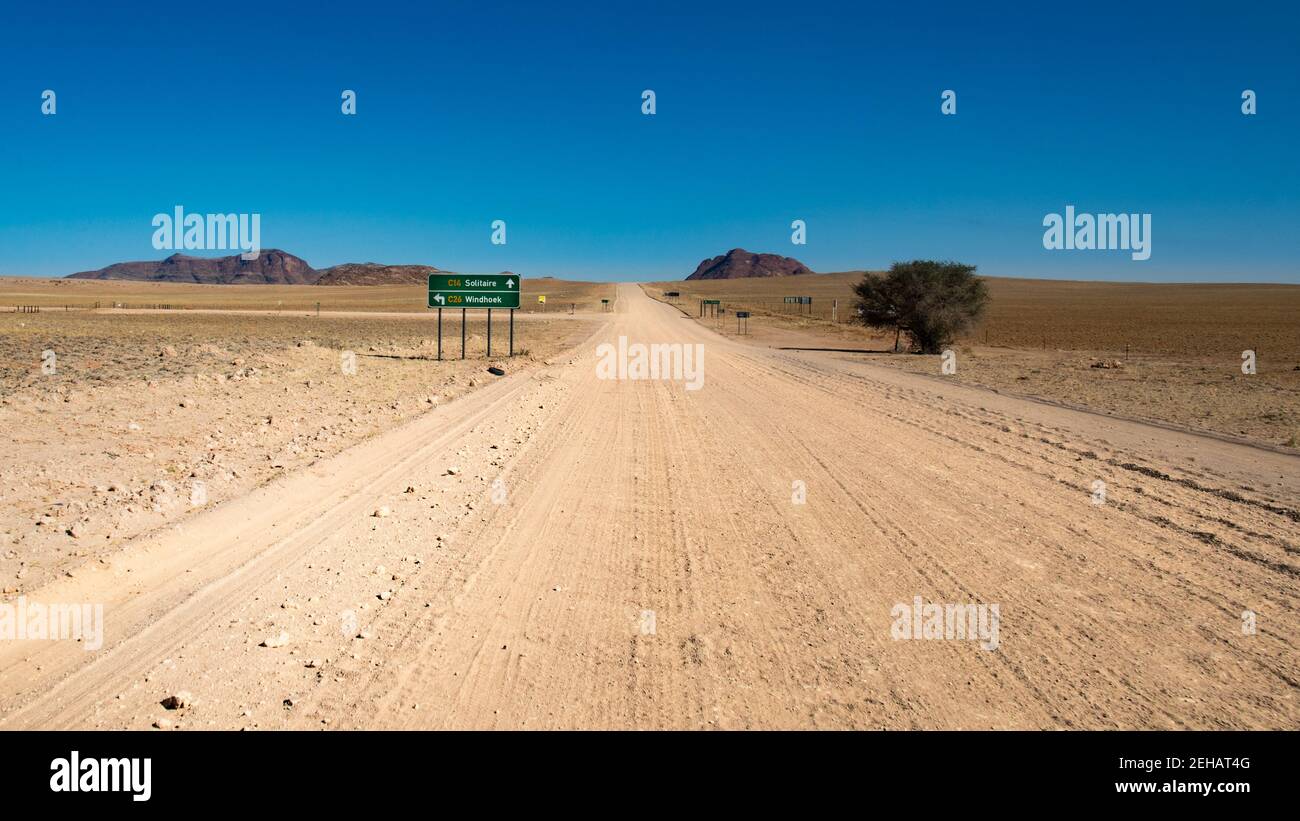 road trip in Namibia endless straight gravel road washboard in the