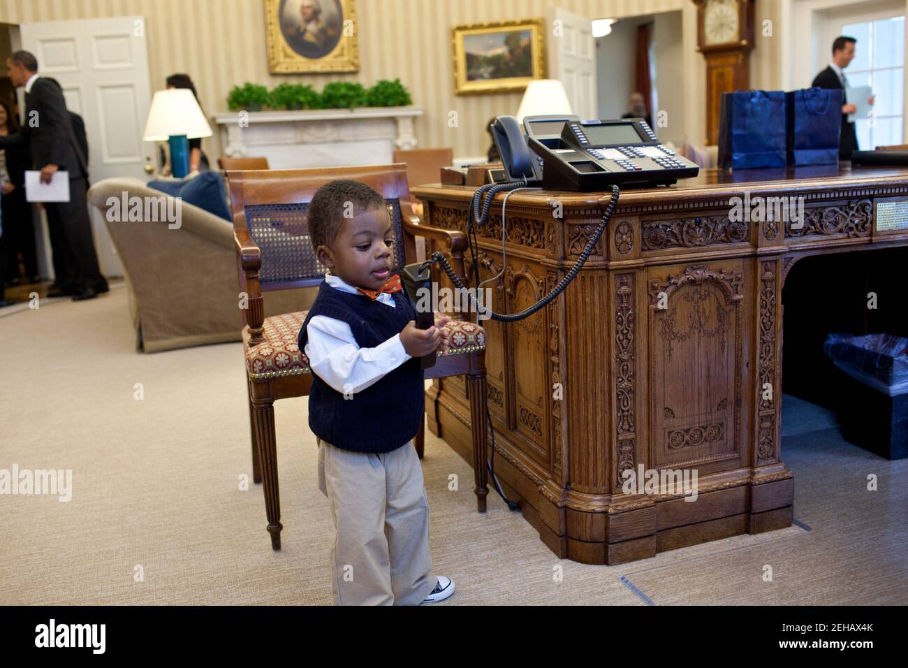 Feb. 7, 2012 'Kids will be kids. After the President had welcomed Lauren Fleming, the March of Dimes national ambassador and her family in the Oval Office, her brother, Corbin Fleming, started to play with the President's telephone. Fortunately, he wasn't able to get through to a head of state.' Stock Photo