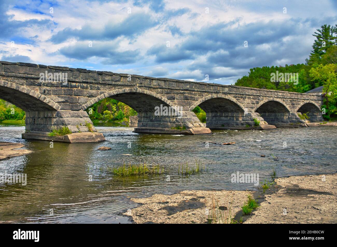 The five-arch stone bridge at Pakenham, Ontario, Canada was built in 1903 and is the only such bridge to exist in North America. Stock Photo