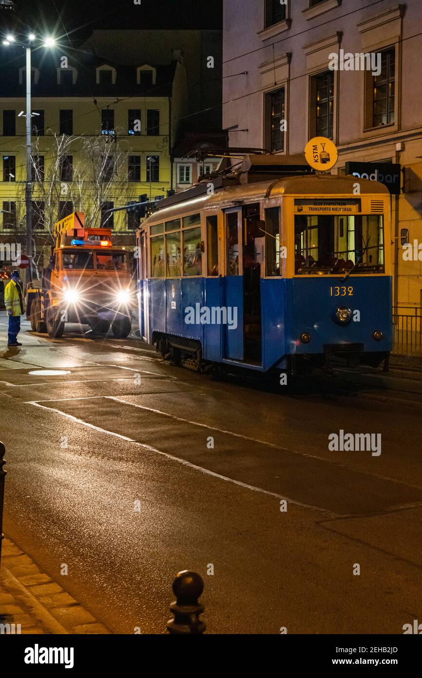 Wroclaw January 17 2020 Old Derailed tram on street at night Stock Photo
