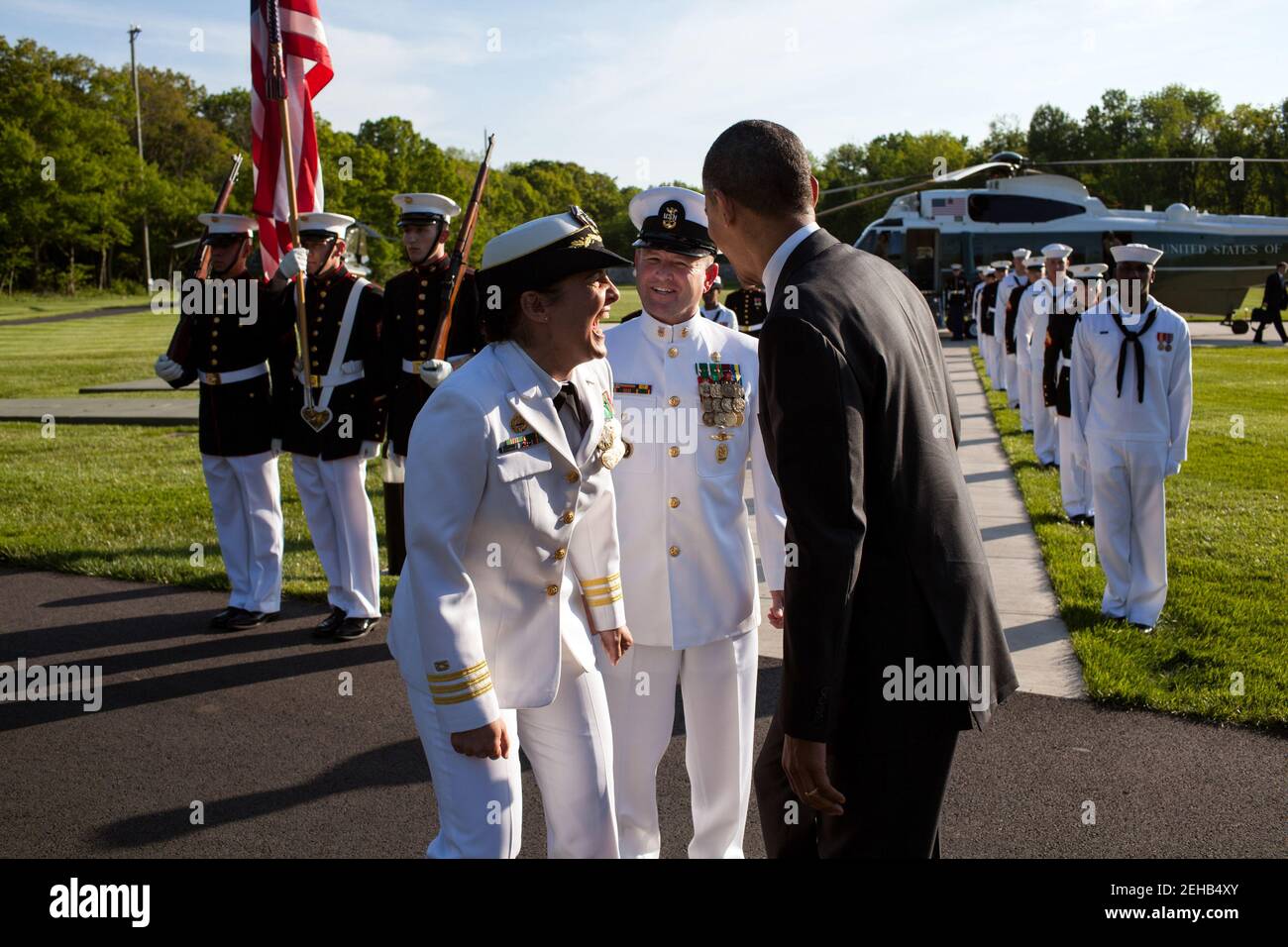 President Barack Obama jokes with Commander Wendy Halsey and Command