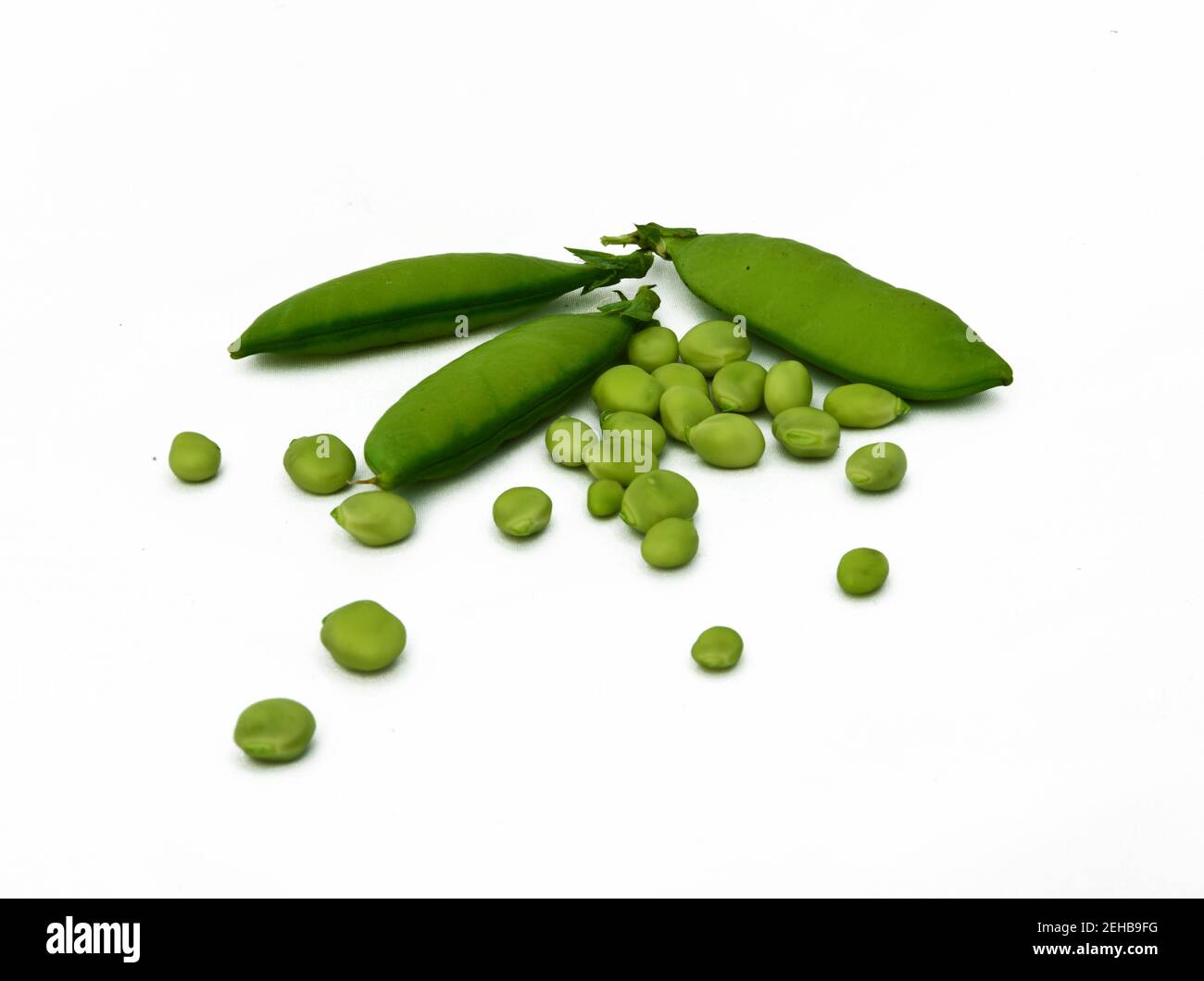 Green peas and garden pods Stock Photo