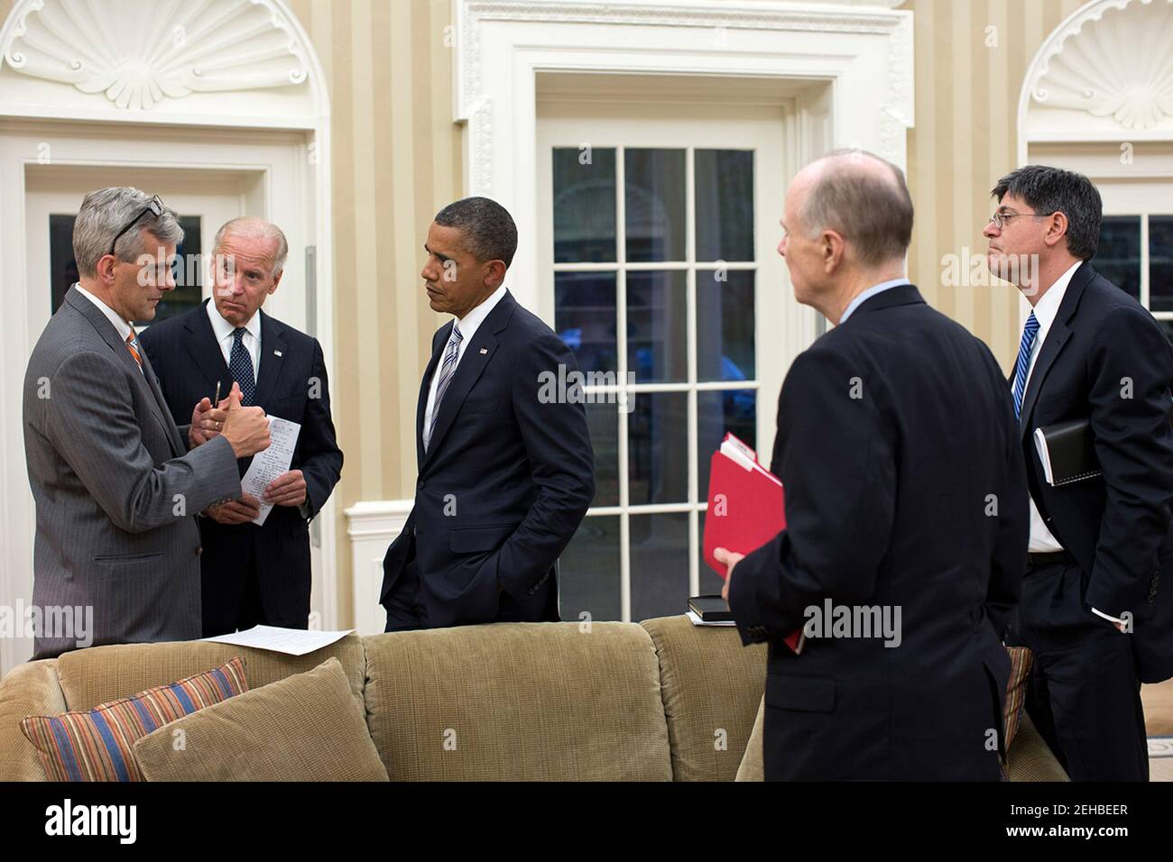 Sept. 11, 2012 Denis McDonough, Deputy National Security Advisor, left, updates the President and Vice President on the situation in the Middle East and North Africa.  National Security Advisor Tom Donilon and Chief of Staff Jack Lew are at right. Stock Photo