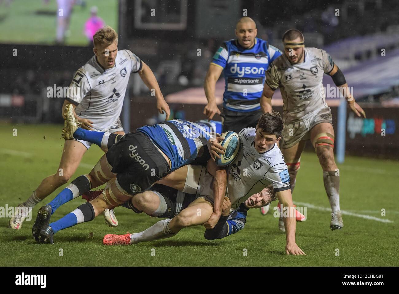 Bath, UK. 19th Feb, 2021. Louis Rees-Zammit #14 of Gloucester rugby is tackled just short of the Bath try line by Tom Ellis #19 of Bath Rugby in Bath, UK on 2/19/2021. (Photo by Gareth Dalley/News Images/Sipa USA) Credit: Sipa USA/Alamy Live News Stock Photo