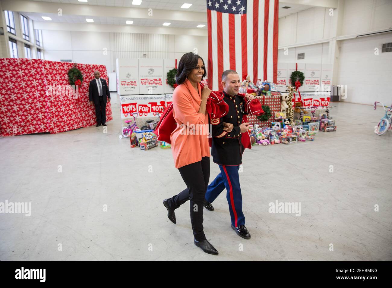 First Lady Michelle Obama visits the Joint Base Anacostia-Bolling Toys for Tots Distribution Center in Washington, D.C., Dec. 11, 2012. Stock Photo