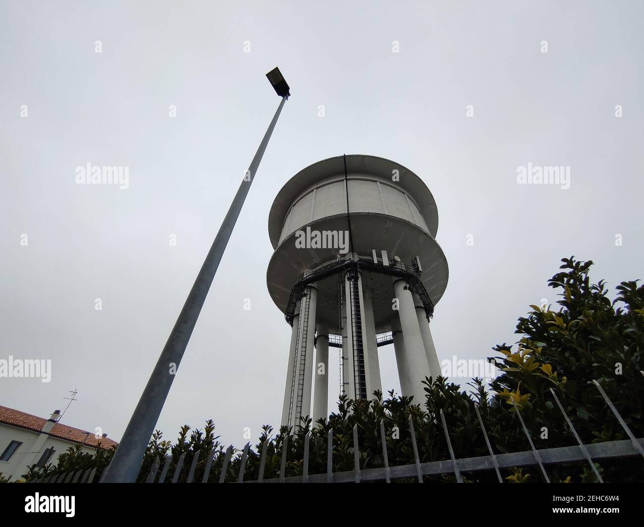 A water tower is an elevated building supporting a water tank