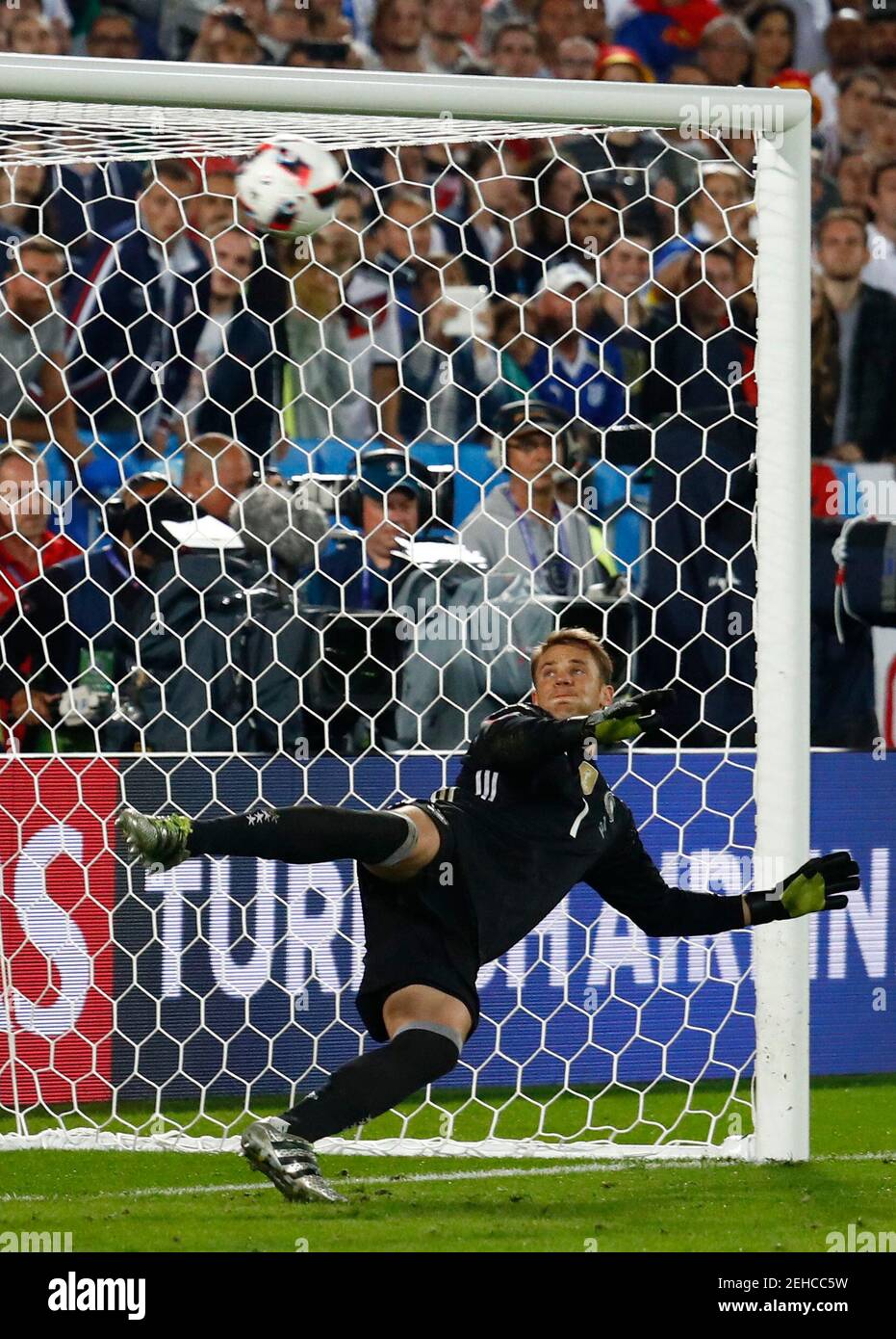 Football Soccer - Germany v Italy - EURO 2016 - Quarter Final - Stade de Bordeaux, Bordeaux, France - 2/7/16  Germany's Manuel Neuer attempts a save during the penalty shootout  REUTERS/Michael Dalder  Livepic Stock Photo