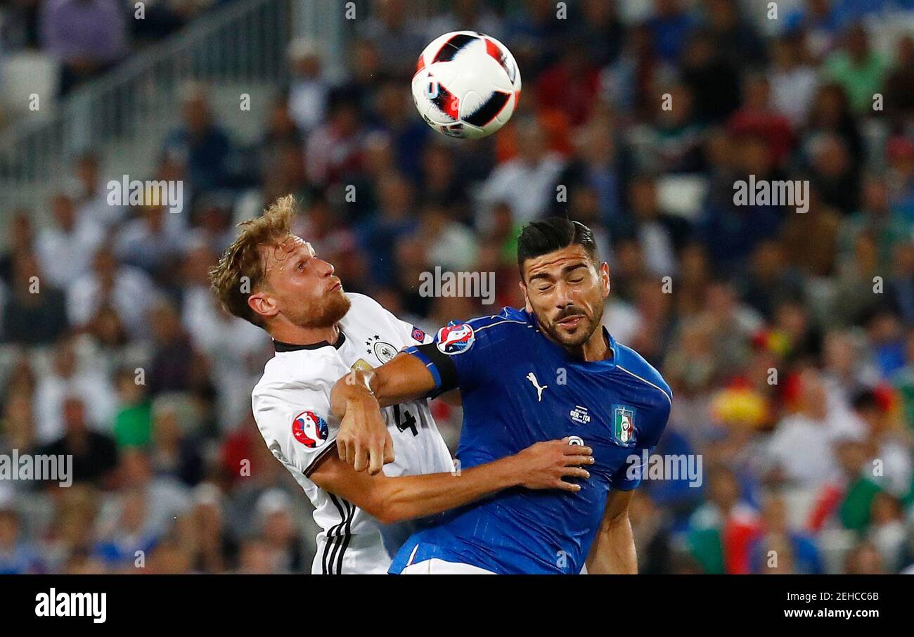Football Soccer - Germany v Italy - EURO 2016 - Quarter Final - Stade de Bordeaux, Bordeaux, France - 2/7/16  Italy's Graziano Pelle in action with Germany's Benedikt Howedes   REUTERS/Michael Dalder  Livepic Stock Photo