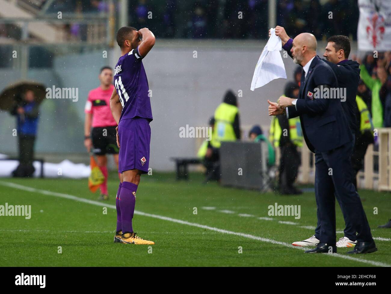 Soccer Football - Serie A - Fiorentina vs Benevento Calcio - Stadio Artemio Franchi, Florence, Italy - March 11, 2018   Fiorentina's Vitor Hugo celebrates scoring their first goal as a shirt with a picture of former player Davide Astori is held up   REUTERS/Alessandro Bianchi Stock Photo