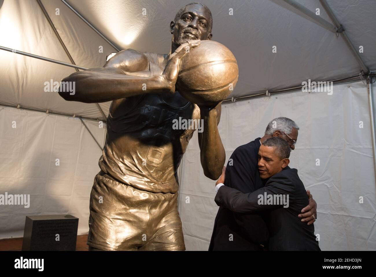 President Barack Obama is greeted by Bill Russell during a stop to view the statue of Russell at City Hall Plaza in Boston, Mass., Oct. 30, 2013. Stock Photo