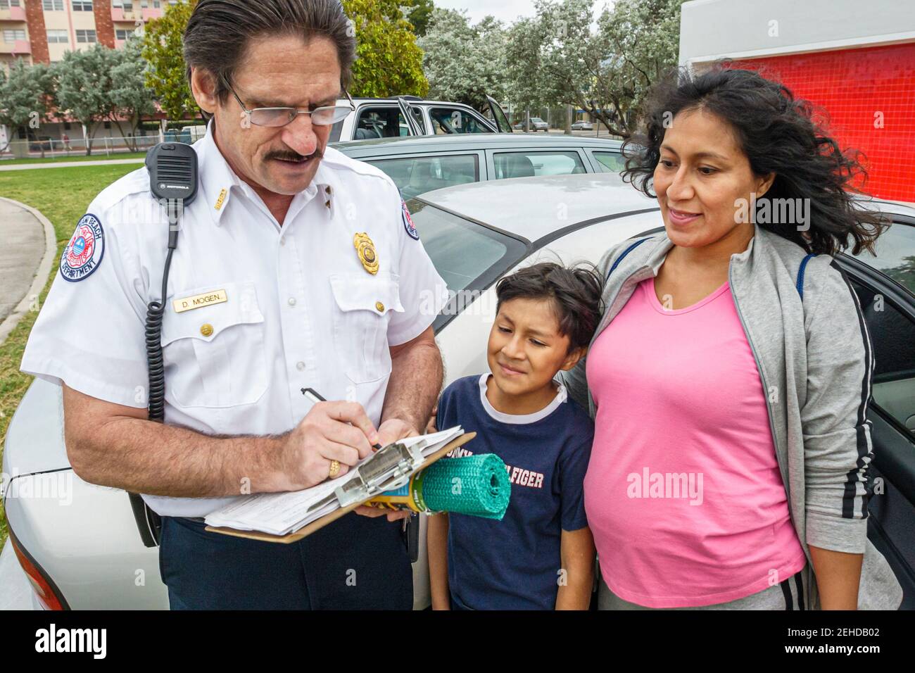 Miami Beach Florida,Police Department child car seat giveaway,Hispanic